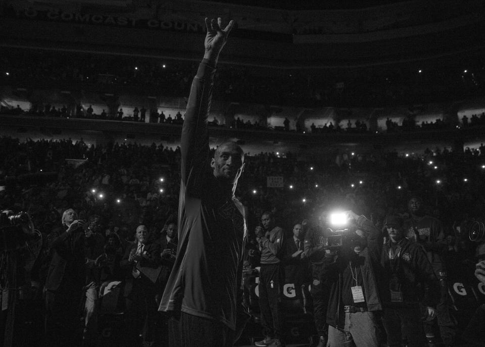 Bryant&nbsp;waves to the&nbsp;Philadelphia&nbsp;crowd, acknowledging their loud ovation, prior to the&nbsp;Lakers' contest&nbsp;against the 76ers on Dec&nbsp;1, 2015. Philadelphia&nbsp;held&nbsp;a pre-game ceremony for Bryant, honoring his 20-year NBA career.