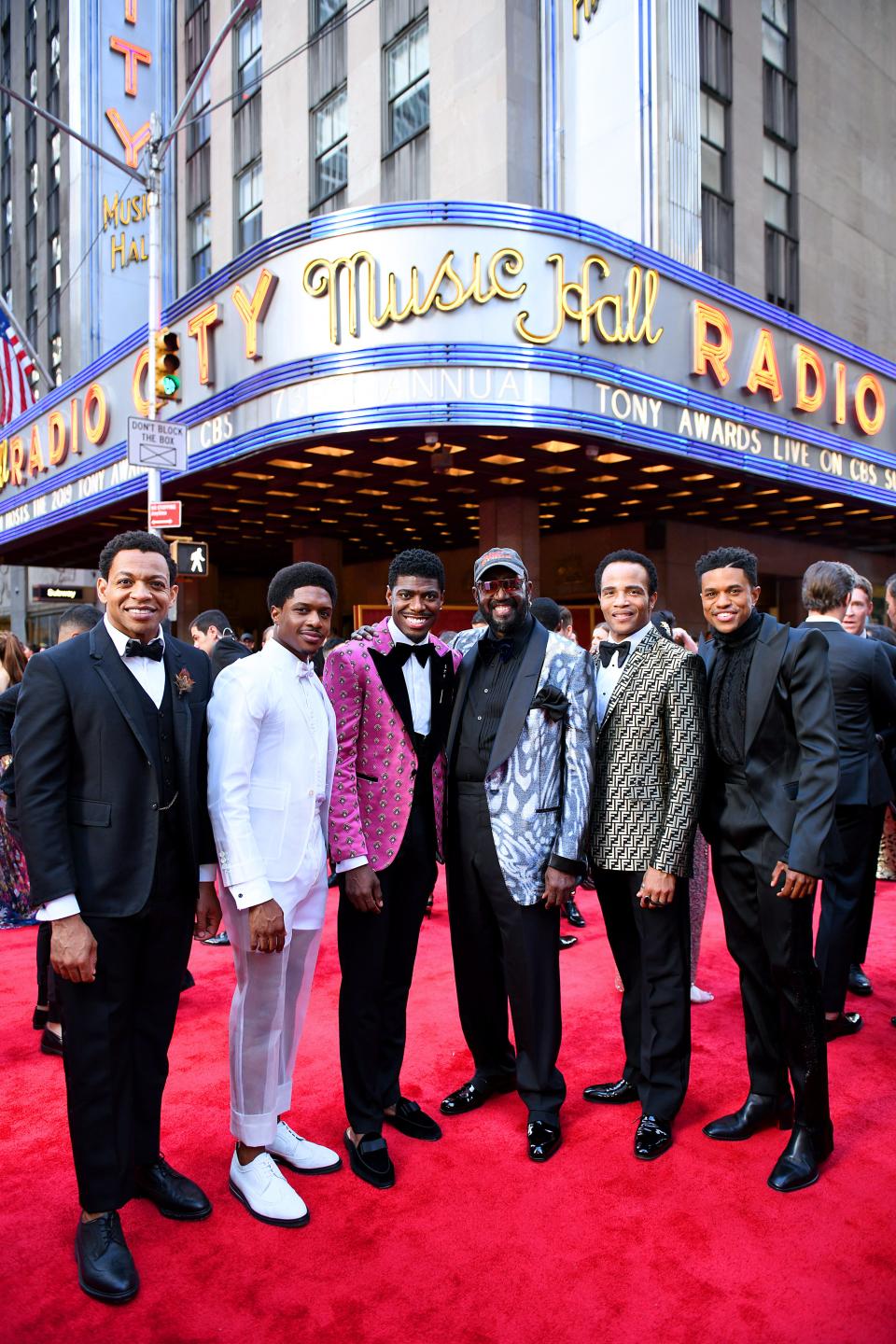 The Temptations' Otis Williams (in ballcap) poses with Jawan Jackson and other cast members of "Ain't Too Proud" at the Tony Awards in New York on June 9, 2019.
