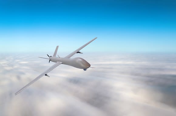 Drone flying above the clouds.