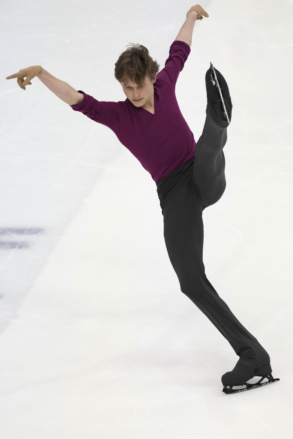 United State's Ilia Malinin competes in the men's short program during the figure skating Grand Prix finals at the Palavela ice arena, in Turin, Italy, Thursday, Dec. 8, 2022. (AP Photo/Antonio Calanni)