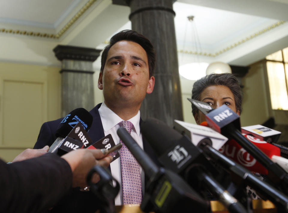 New Zealand's opposition leader Simon Bridges talks to reporters.