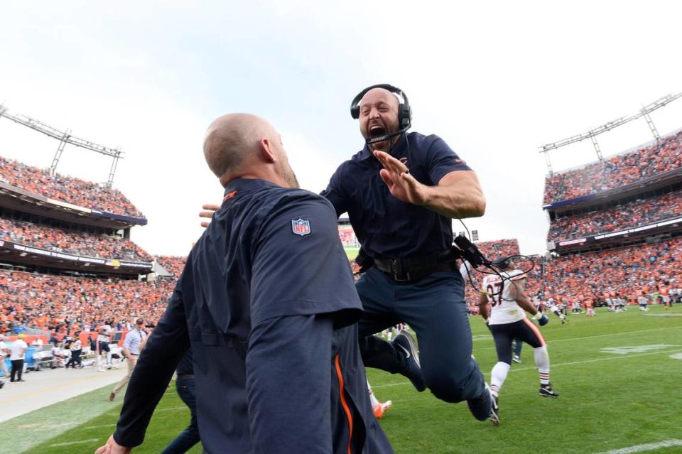 Chicago Bears head coach Matt Nagy (left) and wide receiver coach Mike Furrey celebrate defeating the Denver Broncos in 2019.