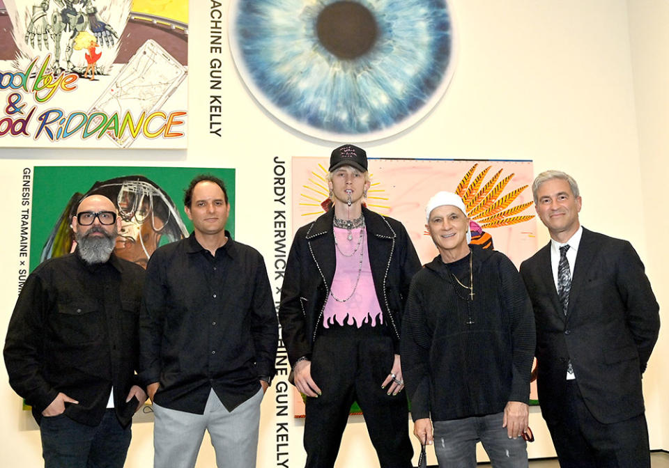 Pulse Music Groups’s Josh Abraham, Interscope’s John Janick, Machine Gun Kelly, Interscope’s Jimmy Iovine and LACMA’s Michael Govan. - Credit: Stefanie Keenan/Getty Images