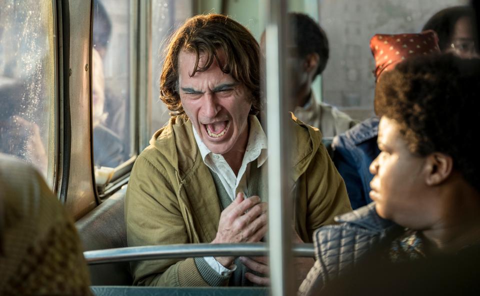 Joaquin Phoenix's Arthur Fleck is having a terrible bus ride in 