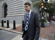 FILE - Nathan Carman departs federal court, Wednesday, Aug. 21, 2019, in Providence, R.I. Carman, who was found floating on a raft in the ocean off the coast of Rhode Island in 2016 after his boat sank, has been indicted on charges alleging he killed his mother at sea to inherit the family's estate, according to the indictment unsealed Tuesday, May 10, 2022. (AP Photo/Steven Senne, File)