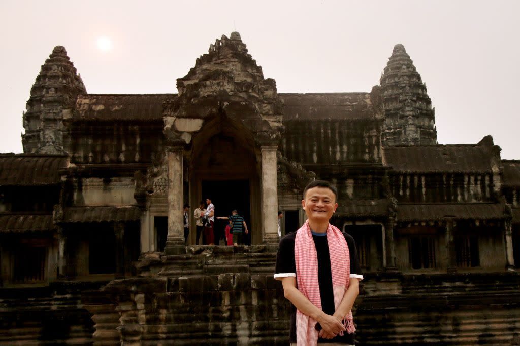 Alibaba Group co-founder and executive chairman Jack Ma, poses for a photo during a visit at Cambodia's ancient Angkor Wat temple in Siem Reap