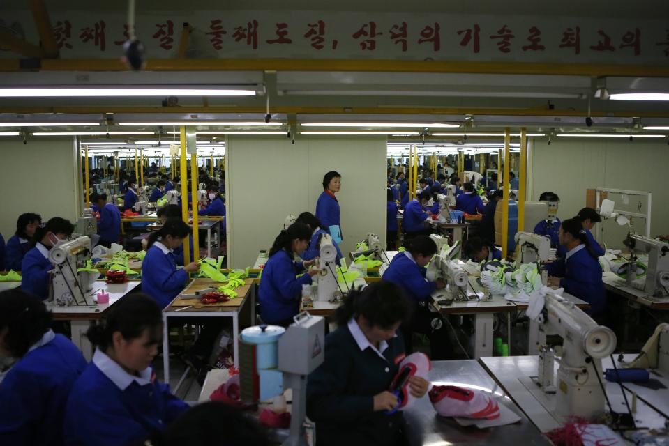 North Korean employees work in a factory of a South Korean company at the Joint Industrial Park in Kaesong industrial zone