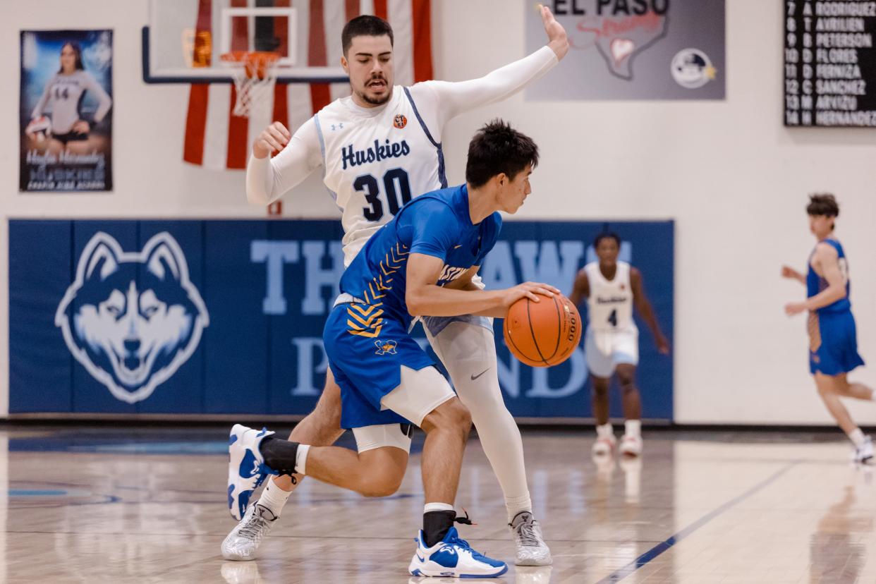 Chapin's Manuel Flores (30) and Eastwood's Andrew Reyes (11) at a boys basketball  game Tuesday, Nov. 16, 2021, at Chapin High School in El Paso, TX.