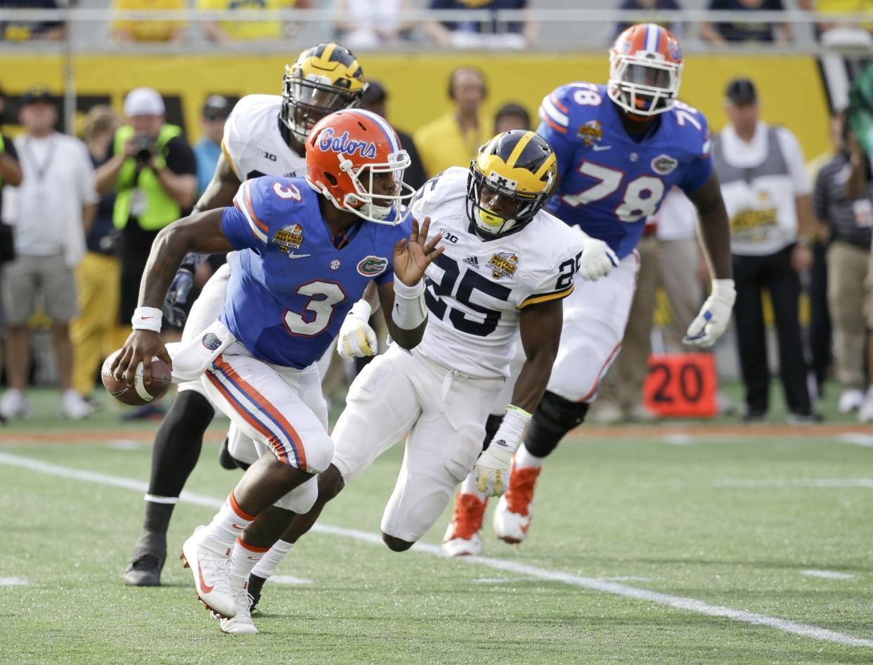 Treon Harris (3) threw for 2,695 yards, 18 TDs and 10 INTs in two seasons as a Florida quarterback. (AP Photo/John Raoux)