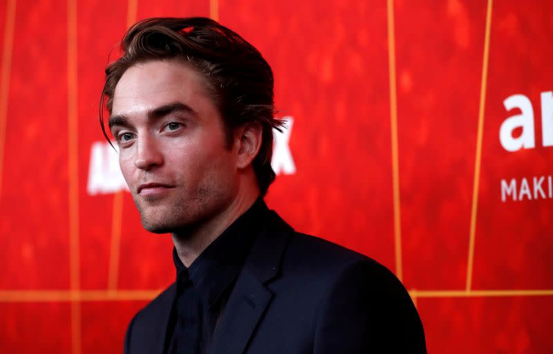 FILE PHOTO: Actor Pattinson poses at the ninth amfAR Gala Los Angeles in Beverly Hills