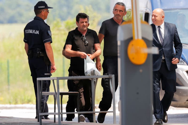 Three Kosovan policemen released at the Kosovo-Serbia border crossing, in Merdare