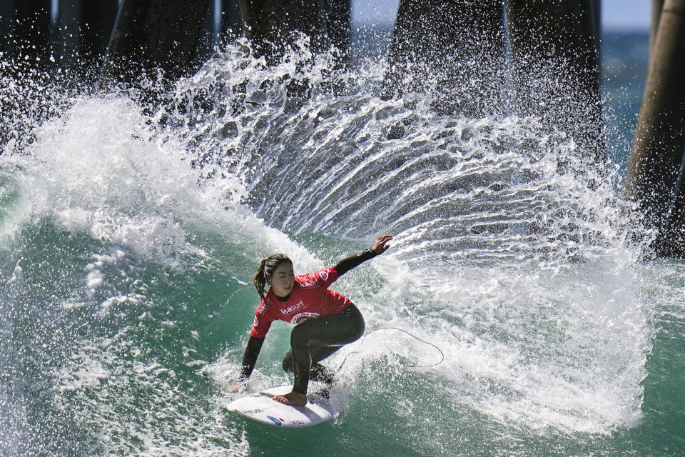 Amuro Tsuzuki, of Japan, competes during the ISA World Surfing Games in Huntington Beach, Calif., Tuesday, Sept. 20, 2022. (AP Photo/Jae C. Hong)