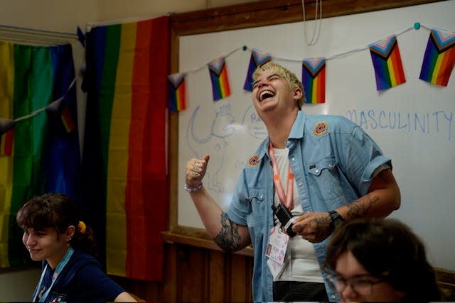 Flint teaching at a summer camp for LGBTQ+ students (Note: this is not his classroom, but rather a room at the camp).