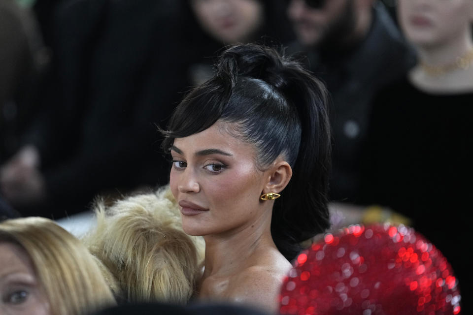 Kylie Jenner attends the Schiaparelli Haute Couture Spring-Summer 2023 collection presented in Paris, Monday, Jan. 23, 2023. (AP Photo/Michel Euler)