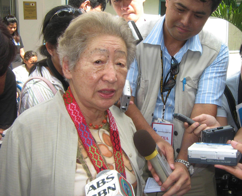 FILE - In this Sept. 18, 2006, file photo, Sadako Ogata, President of the Japan International Cooperation Agency (JICA) talks to the press after visiting the office of Handicap International in Cotabato City in the southern Philippines where she also met Moro Islamic Liberation Front rebel leader Al Haj Ibrahim Murad. Former top U.N. refugee official Ogata, one of the first Japanese women to hold a top job at an international organization, has died. She was 92. (AP Photo/File)