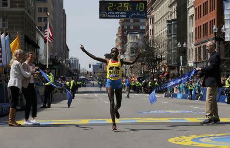 Atsede Baysa of Ethiopia crosses the finish line to win the women?s division of the 120th running of the Boston Marathon in Boston, Massachusetts April 18, 2016. REUTERS/Brian Snyder