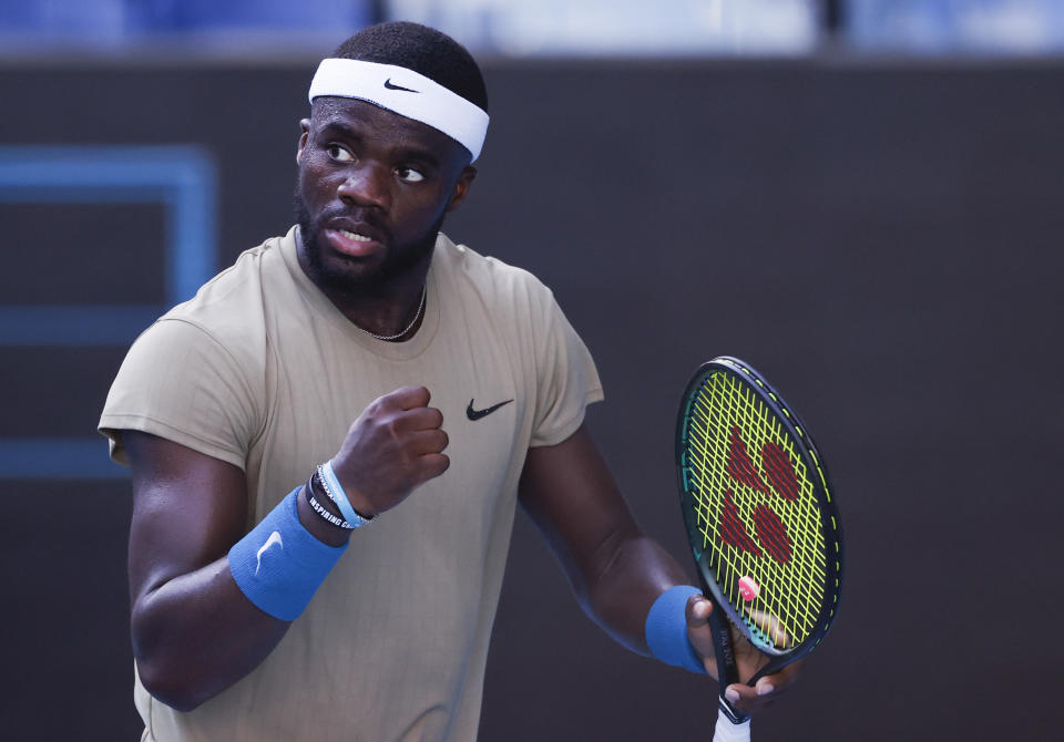 United States' Frances Tiafoe reacts during his second round match against Serbia's Novak Djokovic at the Australian Open tennis championship in Melbourne, Australia, Wednesday, Feb. 10, 2021.(AP Photo/Rick Rycroft)