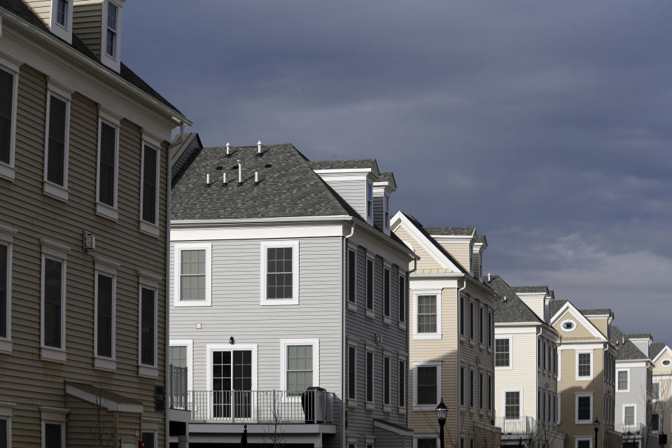 FILE- This Feb. 26, 2018, file photo shows new townhouses in Wood-Ridge, N.J. But retiring a mortgage before you retire isn't always possible. Financial planners recommend creating a Plan B to ensure you don't wind up house rich and cash poor. (AP Photo/Seth Wenig, File)
