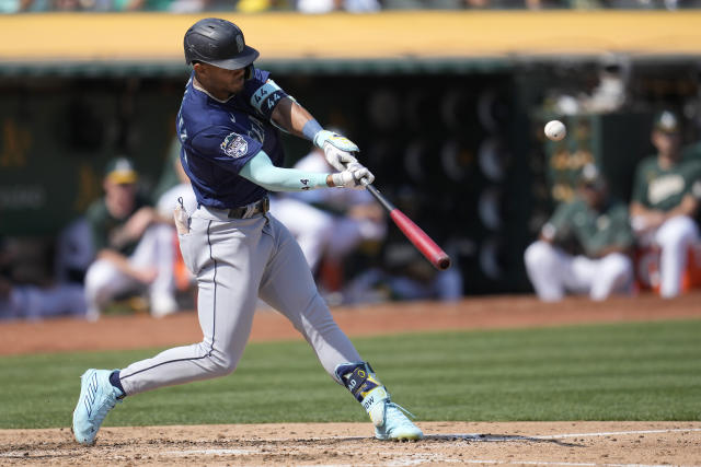 Bats come alive late, Mariners beat A's in 10 innings