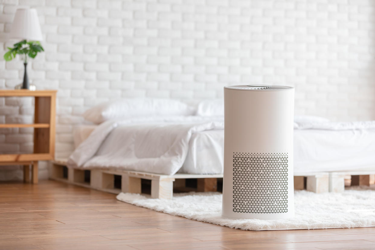 Experts say to consider adding an air purifer to your bedroom to try and minimize allergy symptoms. (Photo:Getty)