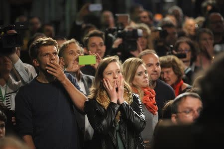 Supporters of the Alliance 90/The Greens party react on first exit polls in the general election (Bundestagswahl) in Berlin, Germany September 24, 2017. REUTERS/Stefanie Loos