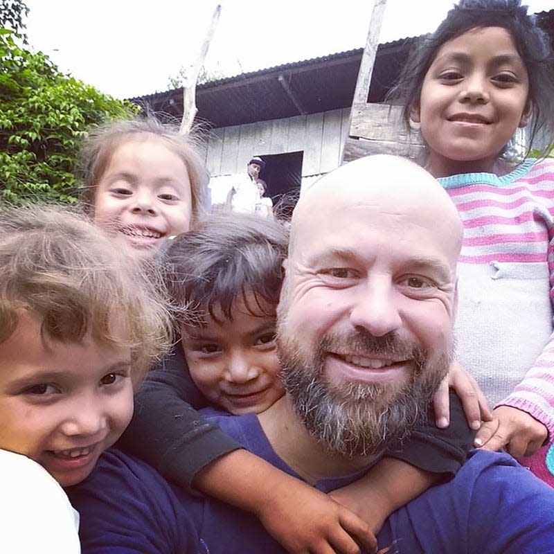 Former St. Augustine resident Nathan Pendleton takes a photo with some of Nicaraguan children served by his nonprofit.