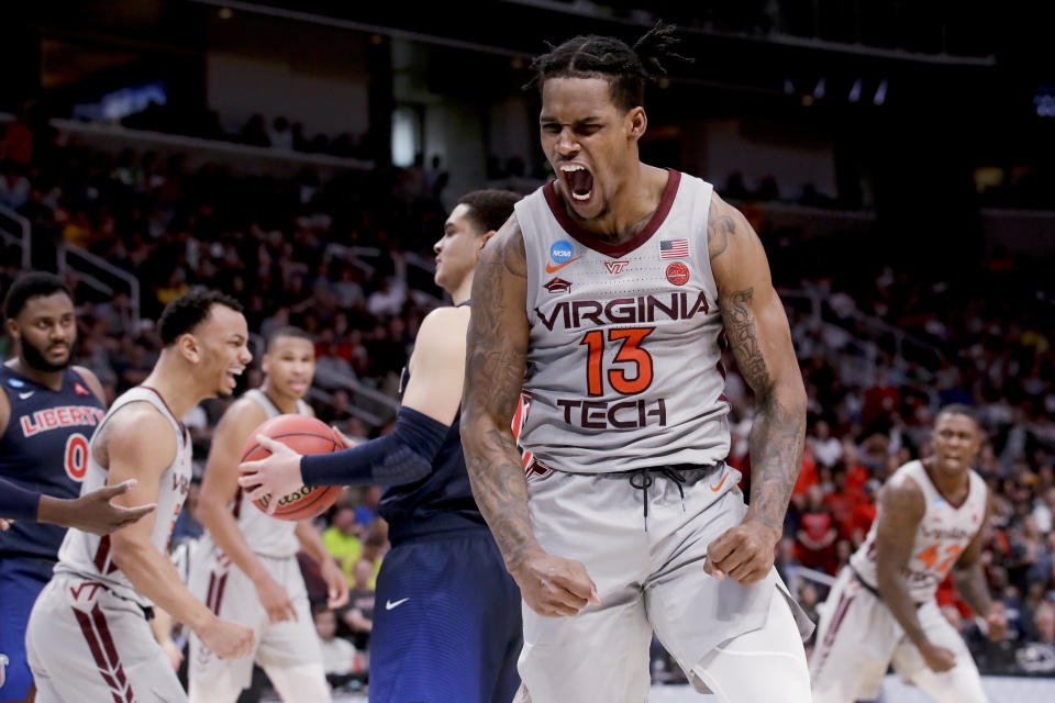 Virginia Tech guard Ahmed Hill celebrates after scoring against Liberty during the second half of a second-round game in the NCAA men's college basketball tournament Sunday, March 24, 2019, in San Jose, Calif. (AP Photo/Jeff Chiu)