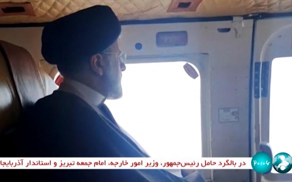 Iran's President Ebrahim Raisi on board the helicopter in the Jofa region of the western province of East Azerbaijan