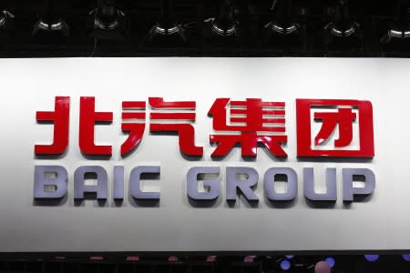 The logo of Beijing Automotive Group (BAIC) is pictured at its booth during the Auto China 2016 auto show in Beijing