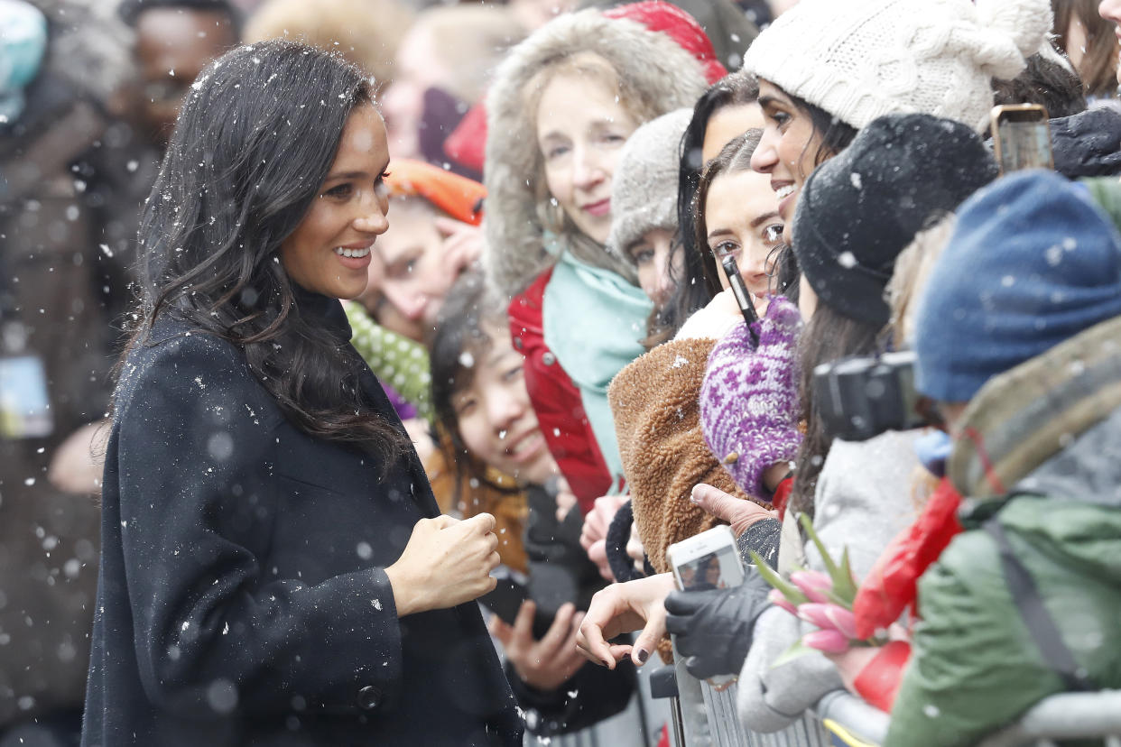 Meghan, pictured in Bristol, is around six months pregnant [Photo: Getty]