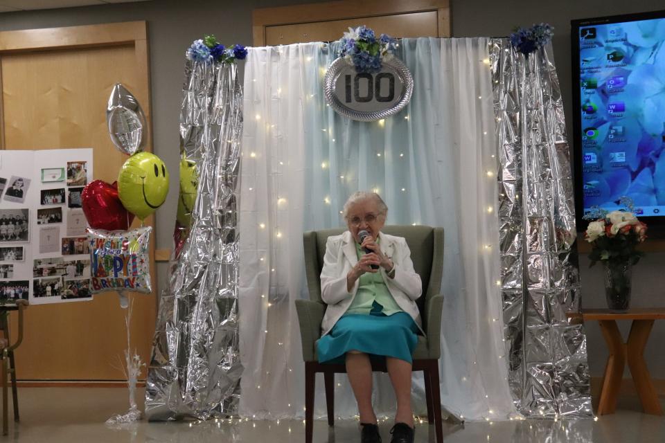 Adrian Dominican Sister Miriam Joseph Lekan offers remarks during a celebration of her 100th birthday April 12.