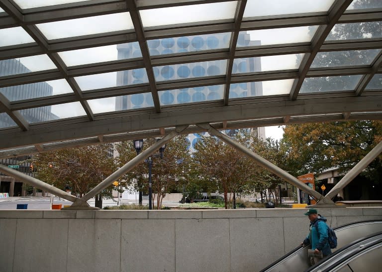 A man enters the Crystal City transit station in Arlington, Virginia, where Amazon will base one of its two new headquarters under a plan to invest $5 billion