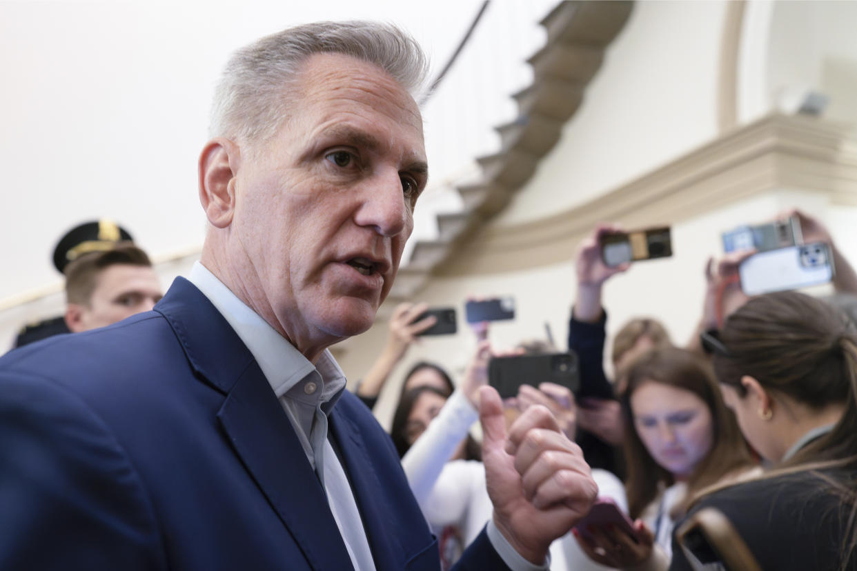 Speaker of the House Kevin McCarthy, R-Calif., talks to reporters about the debt limit negotiations as he arrives at the Capitol in Washington, Friday, May 26, 2023. McCarthy says the mediators "made progress" on a deal with the White House to raise the debt limit and cut federal spending, as they race for agreement this weekend. (AP Photo/J. Scott Applewhite)