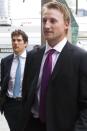 Tampa Bay Lightning's Steven Stamkos, center, and Colorado Avalanche's Steve Downie, left, arrive for collective bargaining talks in Toronto on Tuesday, Aug. 14, 2012. Negotiations continue between the NHL and the NHLPA to avoid a potential lockout. (AP Photo/The Canadian Press, Chris Young)