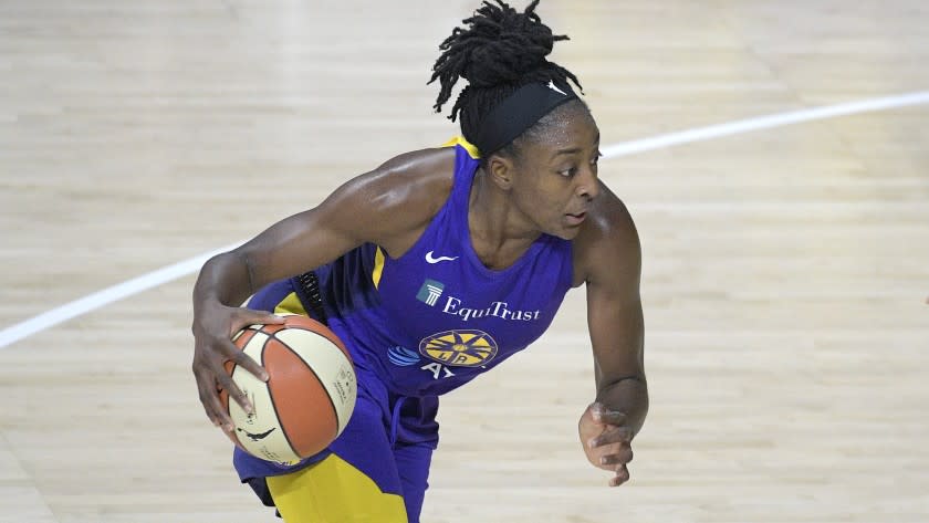 Los Angeles Sparks forward Nneka Ogwumike (30) drives to the basket during the first half of a WNBA basketball game against the Indiana Fever, Saturday, Aug. 15, 2020, in Bradenton, Fla. (AP Photo/Phelan M. Ebenhack)