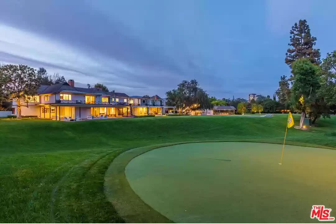 Bob Hope house on a golf course at dusk