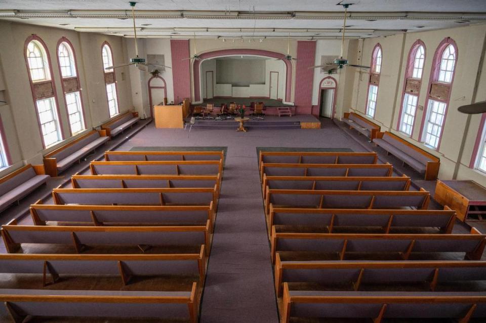 Purple carpet adorns the great hall of the Justice and Dignity Center building on Wednesday, March 20, 2024, in Kansas City. The large auditorium is rarely used these days, but once hosted raucous dances.