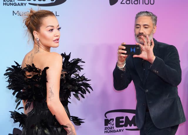 Ian West/PA Images via Getty Rita Ora and Taika Waititi