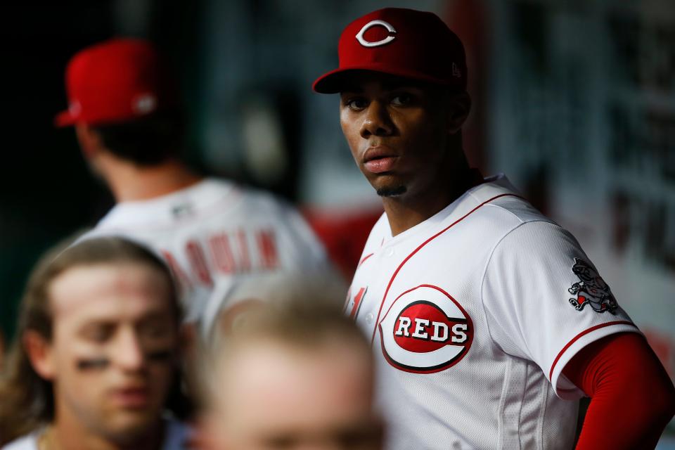 Reds starting pitcher Hunter Greene paces the dugout after the top of the third inning of a game against the Brewers last season.