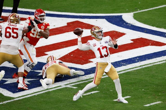 San Francisco 49ers quarterback Brock Purdy (13) throws