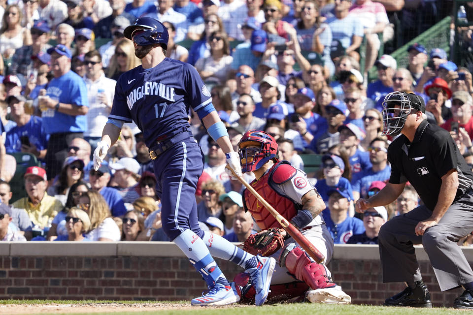 Chicago Cubs' Kris Bryant (17) watches his three-run double against the St. Louis Cardinals during the seventh inning of a baseball game, Friday, July 9, 2021, in Chicago. (AP Photo/David Banks)