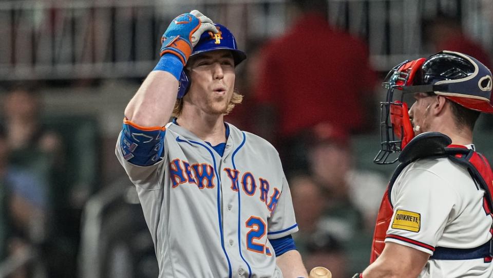 Jun 6, 2023; Cumberland, Georgia, USA; New York Mets third baseman Brett Baty (22) reacts after being called out on strikes against the Atlanta Braves during the second inning at Truist Park.