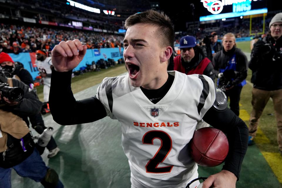 Bengals kicker Evan McPherson celebrates after kicking the game-winning 52-yard field goal to defeat the Tennessee Titans during the AFC Divisional playoff game at Nissan Stadium.