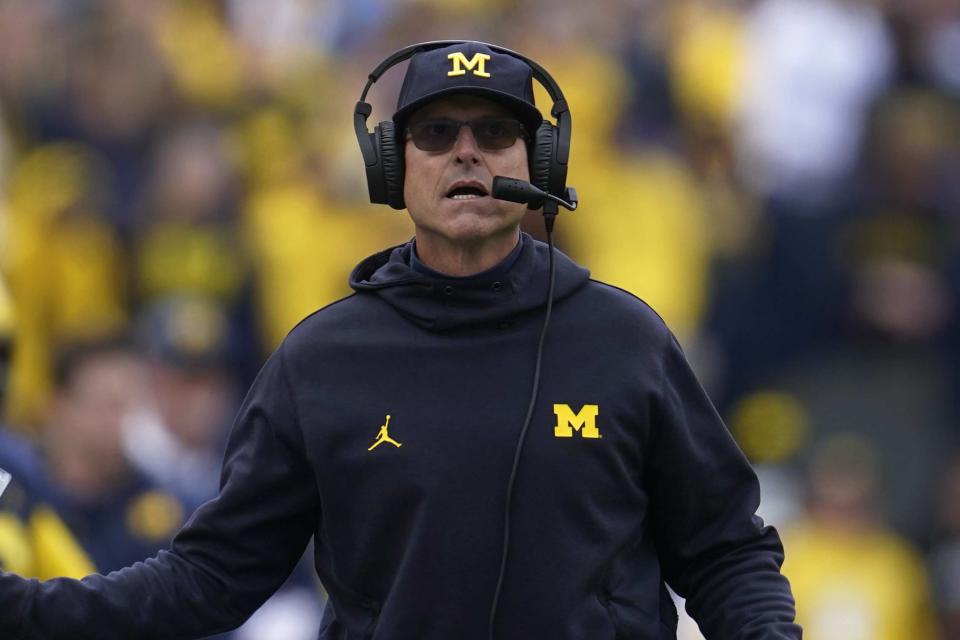 Michigan head coach Jim Harbaugh watches in the first half of an NCAA college football game against Maryland in Ann Arbor, Mich., Saturday, Sept. 24, 2022. (AP Photo/Paul Sancya)