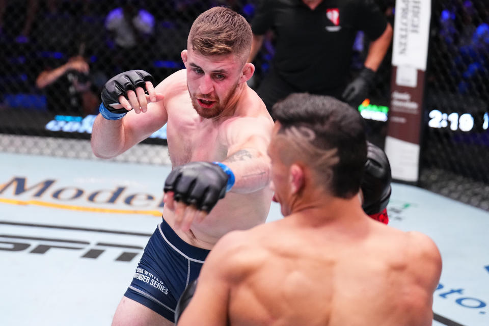 LAS VEGAS, NEVADA – AUGUST 29: (L-R) Mateo Vogel of Canada punches Timothy Cuamba in their featherweight fight during Dana White’s Contender Series season seven, week four at UFC APEX on August 29, 2023 in Las Vegas, Nevada. (Photo by Chris Unger/Zuffa LLC via Getty Images)