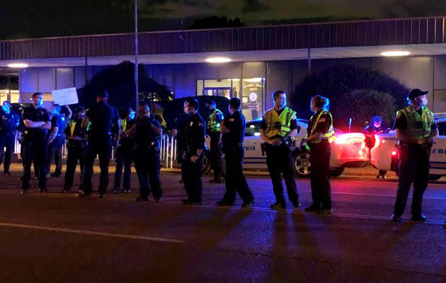 Officers form a line in front of a police precinct Wednesday, May 27, 2020, in Memphis, Tenn., during a protest over the death of George Floyd in police custody earlier in the week in Minneapolis. (Photo: Adrian Sainz via Associated Press)