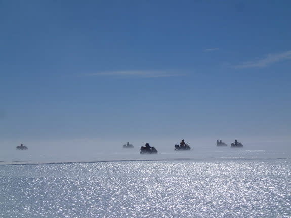 Members of the Belgo-Japanese SAMBA team, mounted on skidoos, fan out in v-shaped formation across the Nansen Ice Field, in order to search for meteorites during a field trip on the plateau, 140km south of Princess Elisabeth Antarctica. (Photo courtesy of International Polar Foundation) <br> <br> <a href="http://www.livescience.com/27550-big-meteorite-found-antarctica.html" rel="nofollow noopener" target="_blank" data-ylk="slk:Click here to see the full collection at LiveScience.com;elm:context_link;itc:0;sec:content-canvas" class="link ">Click here to see the full collection at LiveScience.com</a>