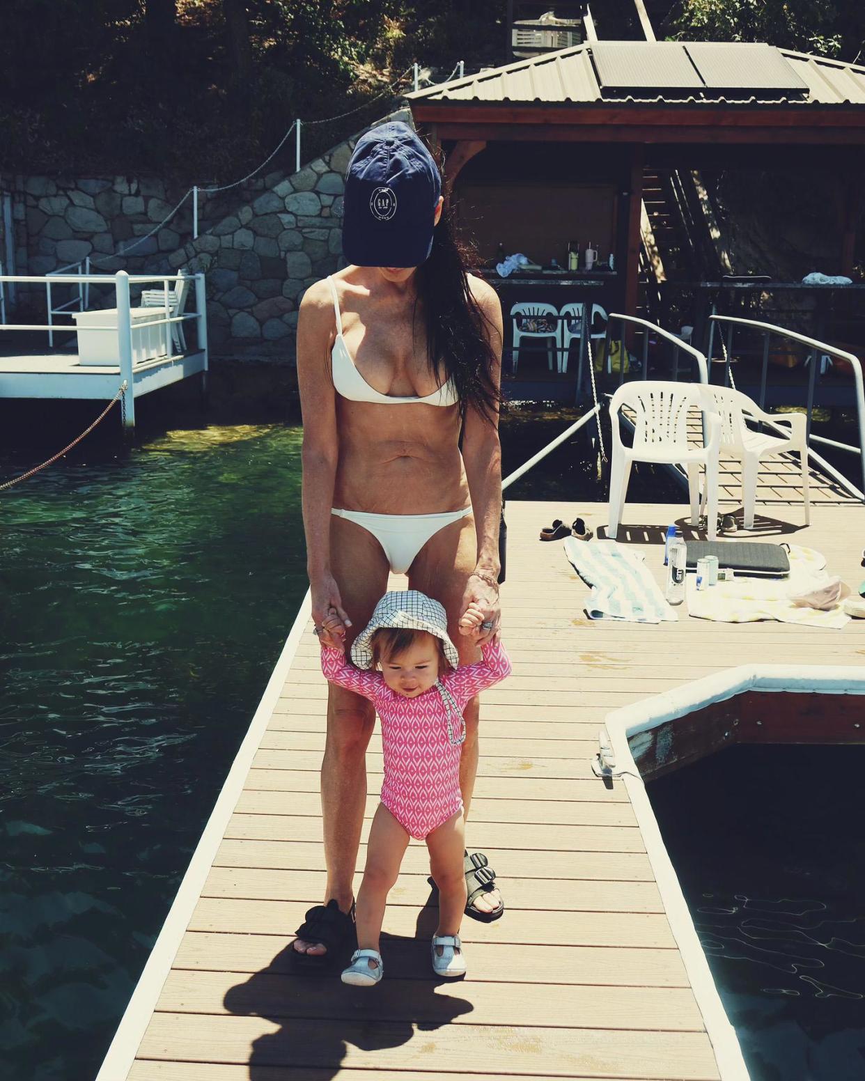 Demi Moore 61 Stuns in White Bikini With Her Baby Granddaughter