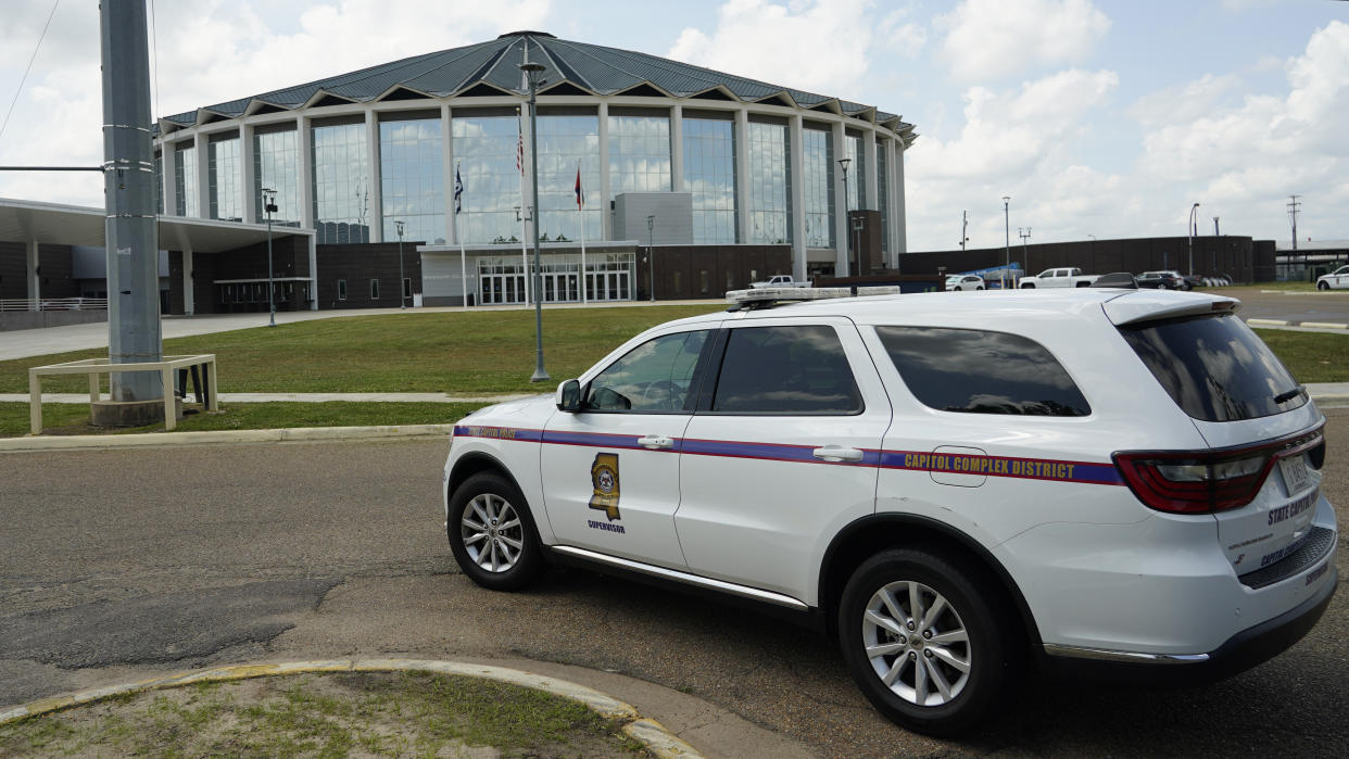 A Capitol Police supervisor drives past the Mississippi Coliseum 