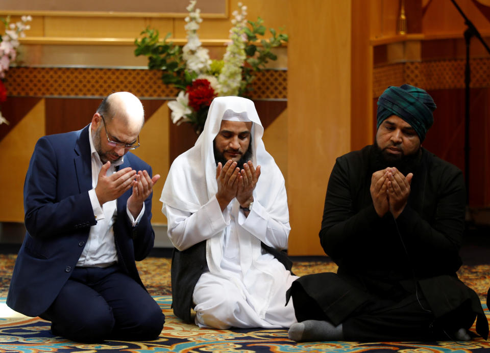 Muslim men pray at a mosque in Manchester for victims of the Manchester Arena attack.